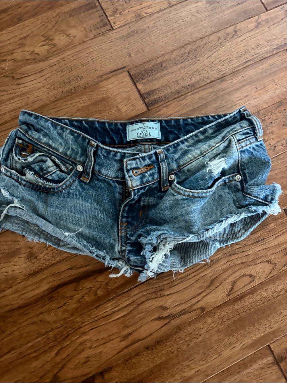 REVICE Distressed Light Blue Denim Cutoff Shorts